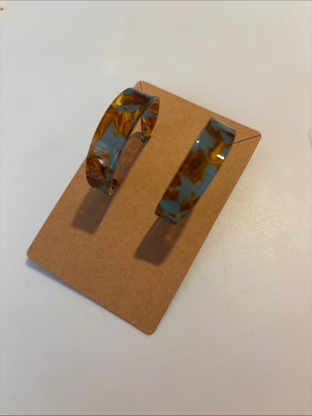 Fashion Jewelry Resin Hoop Earrings in Amber and Teal Tortoiseshell